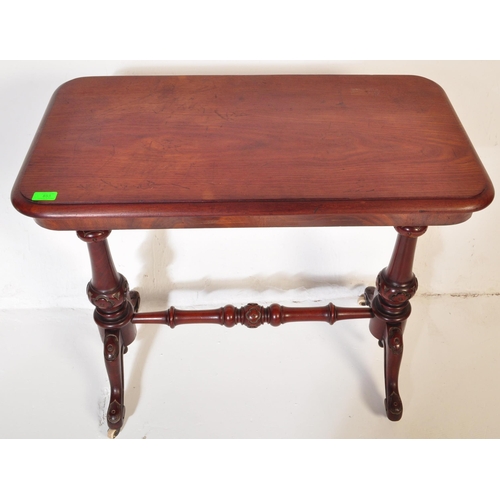 853 - A 19th century Victorian mahogany occasional writing / side table. The top having chamfered edge ove... 