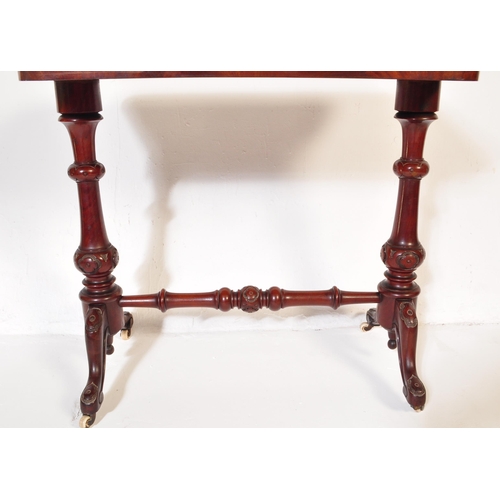 853 - A 19th century Victorian mahogany occasional writing / side table. The top having chamfered edge ove... 