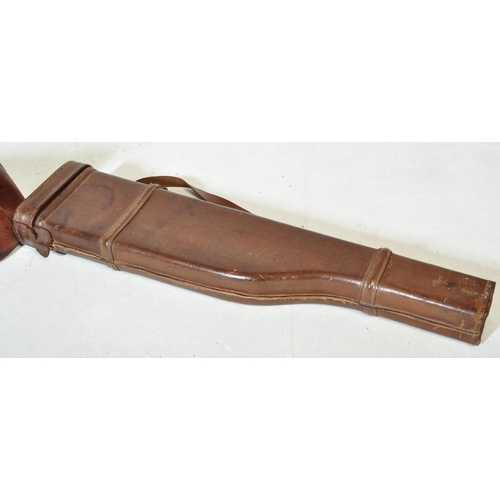 929 - A Victorian 19th century monogrammed leather gun case marked London label to interior (A/F). Togethe... 