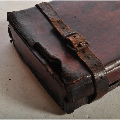 929 - A Victorian 19th century monogrammed leather gun case marked London label to interior (A/F). Togethe... 
