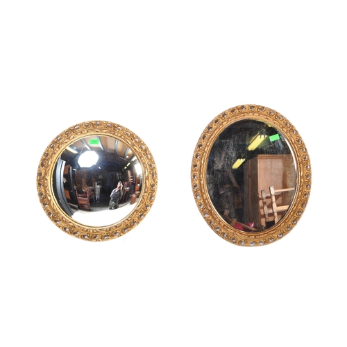 936 - Two vintage 20th century bevelled glass wall mirrors with pierced gilt frames of foliate patterns. T... 