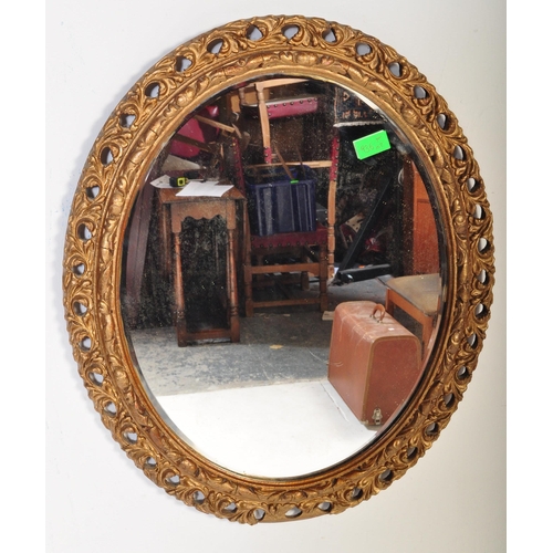 936 - Two vintage 20th century bevelled glass wall mirrors with pierced gilt frames of foliate patterns. T... 