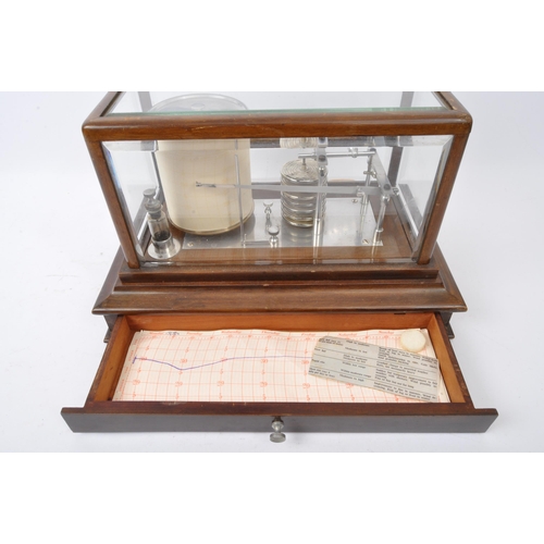 955 - A vintage 20th Century barograph. The barometric pressure reading with ink bottle and instruments in... 
