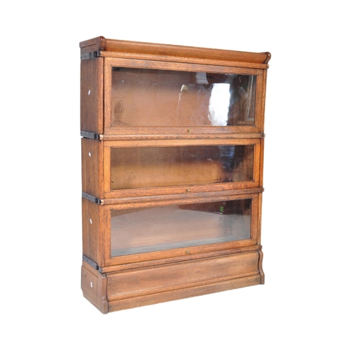 969 - A vintage 20th Century circa 1920s oak Lawyers solicitors glazed bookcase. Of rectangular form with ... 