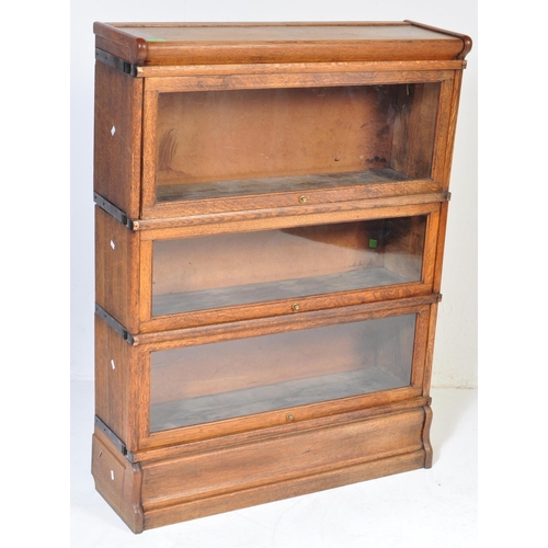 969 - A vintage 20th Century circa 1920s oak Lawyers solicitors glazed bookcase. Of rectangular form with ... 