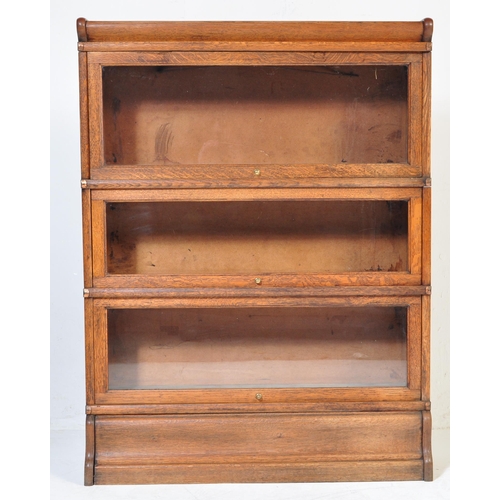 969 - A vintage 20th Century circa 1920s oak Lawyers solicitors glazed bookcase. Of rectangular form with ... 