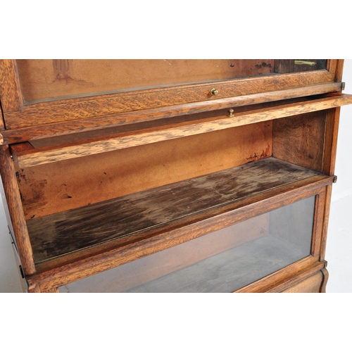 969 - A vintage 20th Century circa 1920s oak Lawyers solicitors glazed bookcase. Of rectangular form with ... 