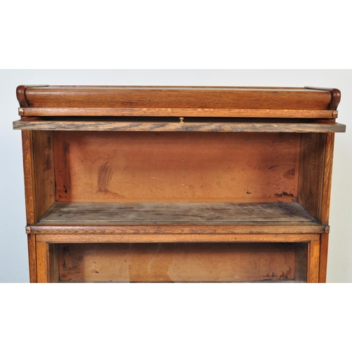 969 - A vintage 20th Century circa 1920s oak Lawyers solicitors glazed bookcase. Of rectangular form with ... 