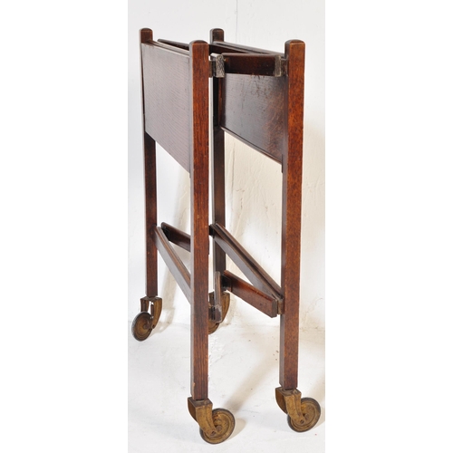 978 - An early 20th century circa 1930s oak wood hostess folding drink trolley having tow removable tiers ... 