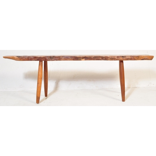 981 - A contemporary driftwood rustic bench / table from a member of the Gloucestershire Guild of Craftsme... 