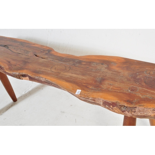 981 - A contemporary driftwood rustic bench / table from a member of the Gloucestershire Guild of Craftsme... 