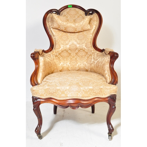 984 - A 19th Century Victorian carved mahogany library / nursing chair. Having a shaped back rest with str... 