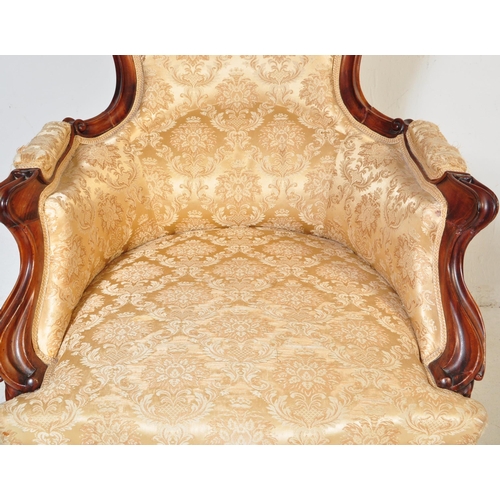 984 - A 19th Century Victorian carved mahogany library / nursing chair. Having a shaped back rest with str... 