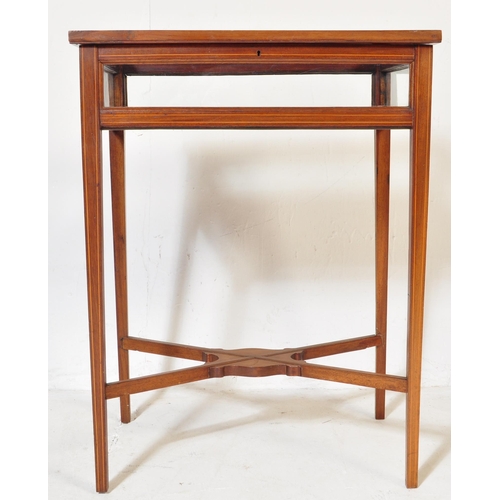 987 - An Edwardian early 20th Century circa 1900s bijouterie cabinet table. Of rectangular form with glass... 