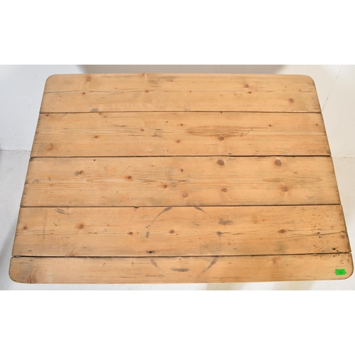 990 - A vintage 20th Century pine farmhouse refectory table. Of rectangular form with wood slatted top, wi... 