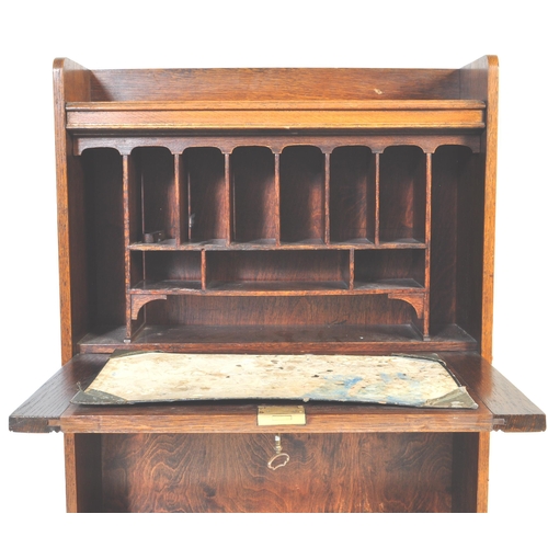998 - A vintage early 20th Century Arts & Craft circa 1930s oak bureau student bookcase. Of rectangular fo... 