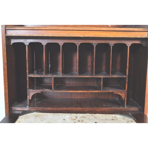 998 - A vintage early 20th Century Arts & Craft circa 1930s oak bureau student bookcase. Of rectangular fo... 