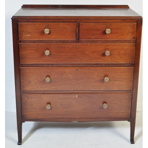 1050 - A mid century Air Ministry style mahogany chest of drawers. Raised on stile supports with 2 short ov... 