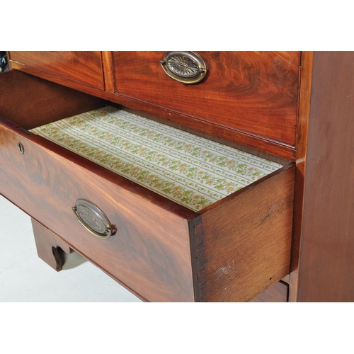 1052 - A 19th century George III flamed mahogany chest of drawers. Raised on bracket feet with 2 short over... 