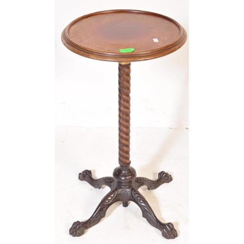 1063 - Victorian 19th century cast iron and mahogany pedestal wine table. The cast iron base in the manner ... 