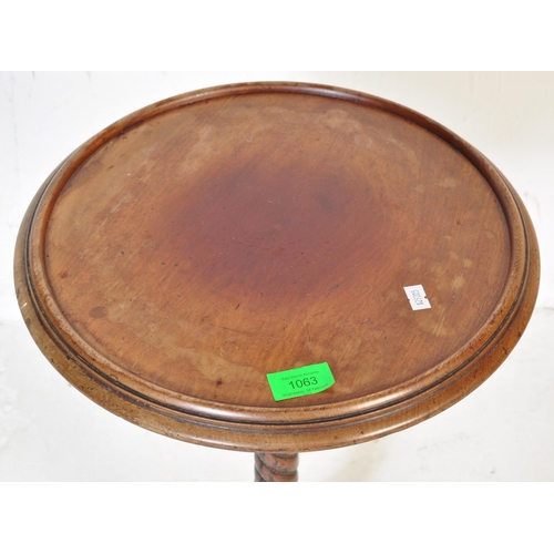 1063 - Victorian 19th century cast iron and mahogany pedestal wine table. The cast iron base in the manner ... 