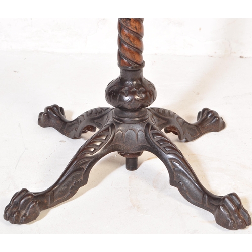 1063 - Victorian 19th century cast iron and mahogany pedestal wine table. The cast iron base in the manner ... 
