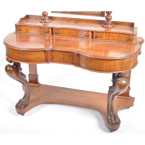 1064 - A Victorian 19th century large mahogany Duchess dressing table. Raised on hairy paw feet legs with l... 