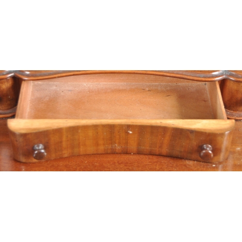 1064 - A Victorian 19th century large mahogany Duchess dressing table. Raised on hairy paw feet legs with l... 