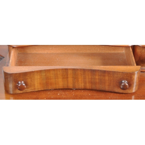 1064 - A Victorian 19th century large mahogany Duchess dressing table. Raised on hairy paw feet legs with l... 