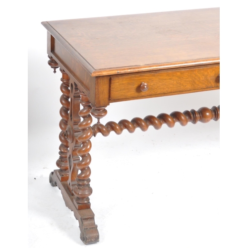 1065 - Victorian 19th century carved oak barley twist library writing table desk. Raised on splayed feet wi... 
