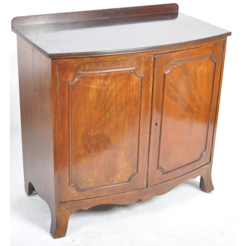 1066 - An Edwardian mahogany bow fronted sideboard cabinet. Raised on bracket feet with a bow fronted body ... 