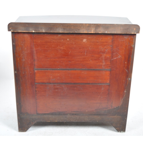 1066 - An Edwardian mahogany bow fronted sideboard cabinet. Raised on bracket feet with a bow fronted body ... 