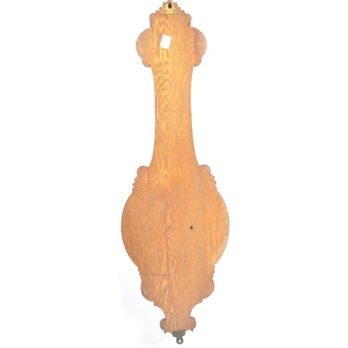 1073 - Early 20th century large oak aneroid wall barometer - thermometer banjo shaped compendium. Carved oa... 