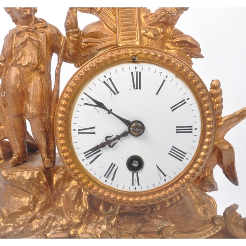 1075 - 19th century French gilt metal 24hour mantel clock with glass dome. The gilt metal clock with boy an... 