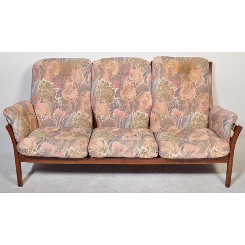607 - A late 20th century retro Ercol Renaissance model living room three piece suite. The lot to include ... 