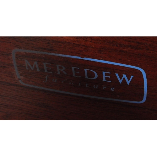 611 - A British Modern Design – Mid century Meredew teak wood and ebonised flash work dressing table being... 