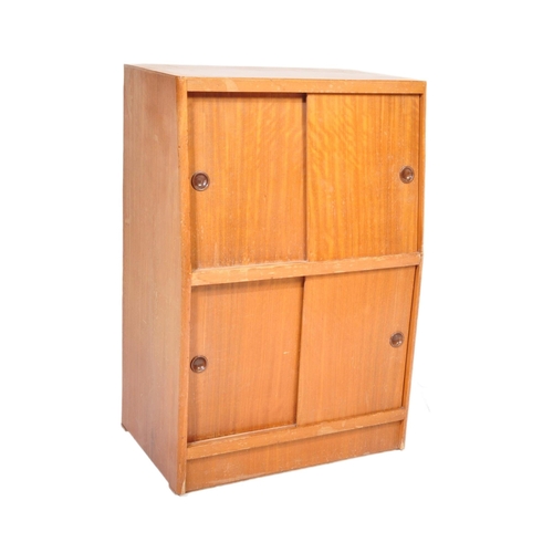 613 - 1.     Mid-century teak wood side cabinet bookcase of Danish influence having sliding doors with she... 