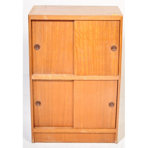 613 - 1.     Mid-century teak wood side cabinet bookcase of Danish influence having sliding doors with she... 