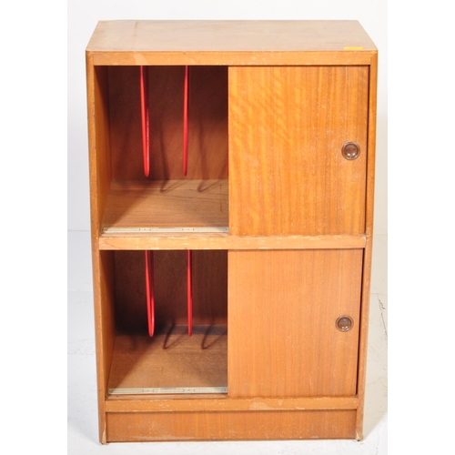 613 - 1.     Mid-century teak wood side cabinet bookcase of Danish influence having sliding doors with she... 