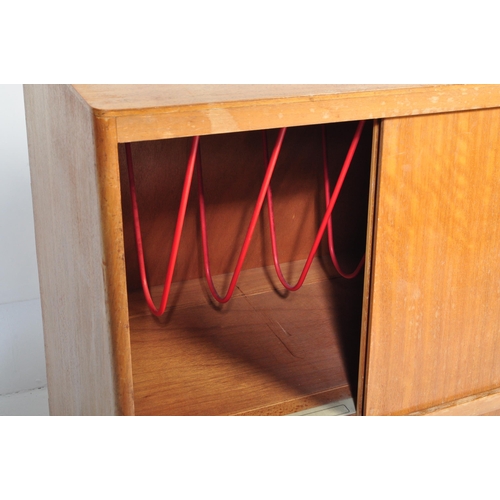 613 - 1.     Mid-century teak wood side cabinet bookcase of Danish influence having sliding doors with she... 