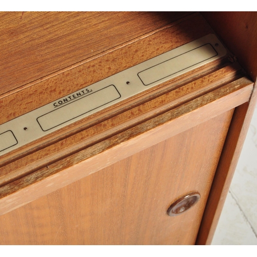 613 - 1.     Mid-century teak wood side cabinet bookcase of Danish influence having sliding doors with she... 