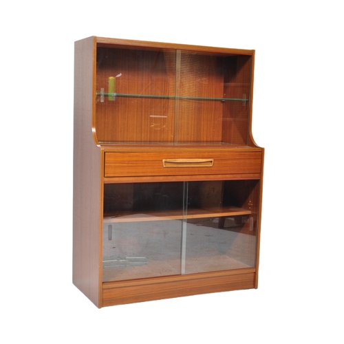 623 - British Modern Design – Mid -century teak veneer drinks display cabinet. Lower sliding door glass ca... 