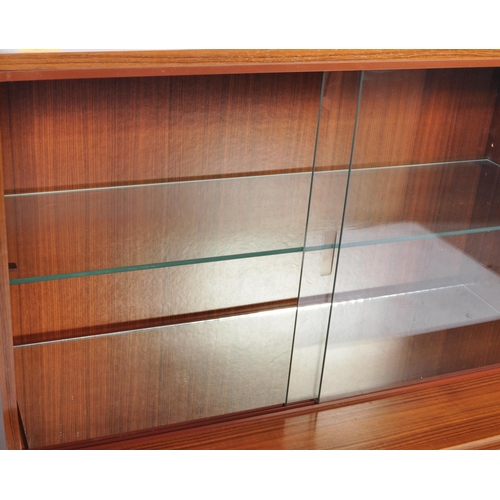 623 - British Modern Design – Mid -century teak veneer drinks display cabinet. Lower sliding door glass ca... 