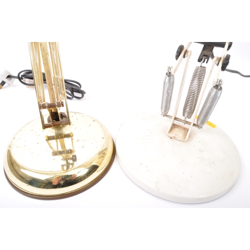626 - A pair of retro vintage mid 20th Century angle poise desk table lamps. One having a tapering circula... 