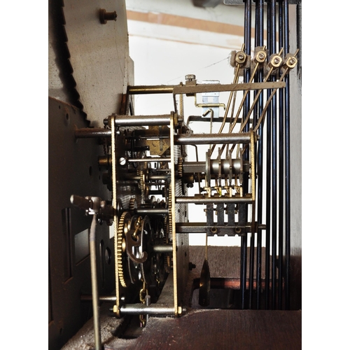 845 - A 20th century longcase grandfather clock. The clock having a gilded face ornate brass spandrels to ... 