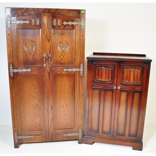 934 - Jacobean revival oak bachelors wardrobe and similar single full size wardrobe, both in the manner of... 