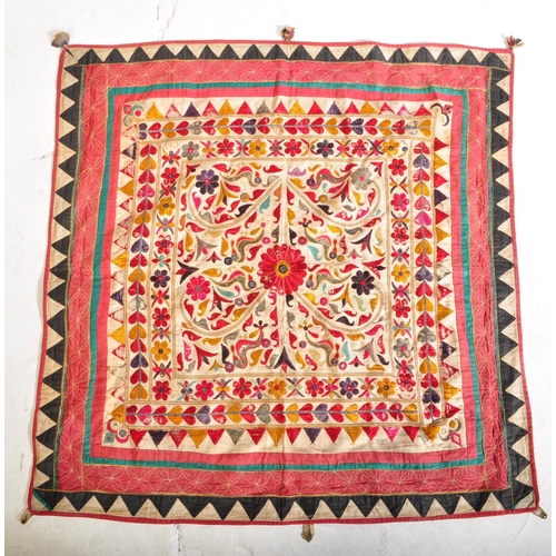 942 - Two vintage 20th century Oriental Middle Eastern hanging wall tapestries. The lot to include floral ... 