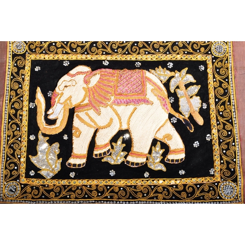 942 - Two vintage 20th century Oriental Middle Eastern hanging wall tapestries. The lot to include floral ... 