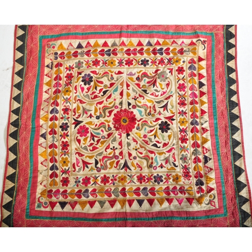 942 - Two vintage 20th century Oriental Middle Eastern hanging wall tapestries. The lot to include floral ... 