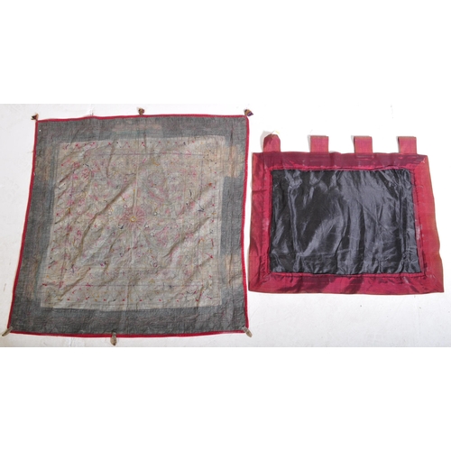 942 - Two vintage 20th century Oriental Middle Eastern hanging wall tapestries. The lot to include floral ... 